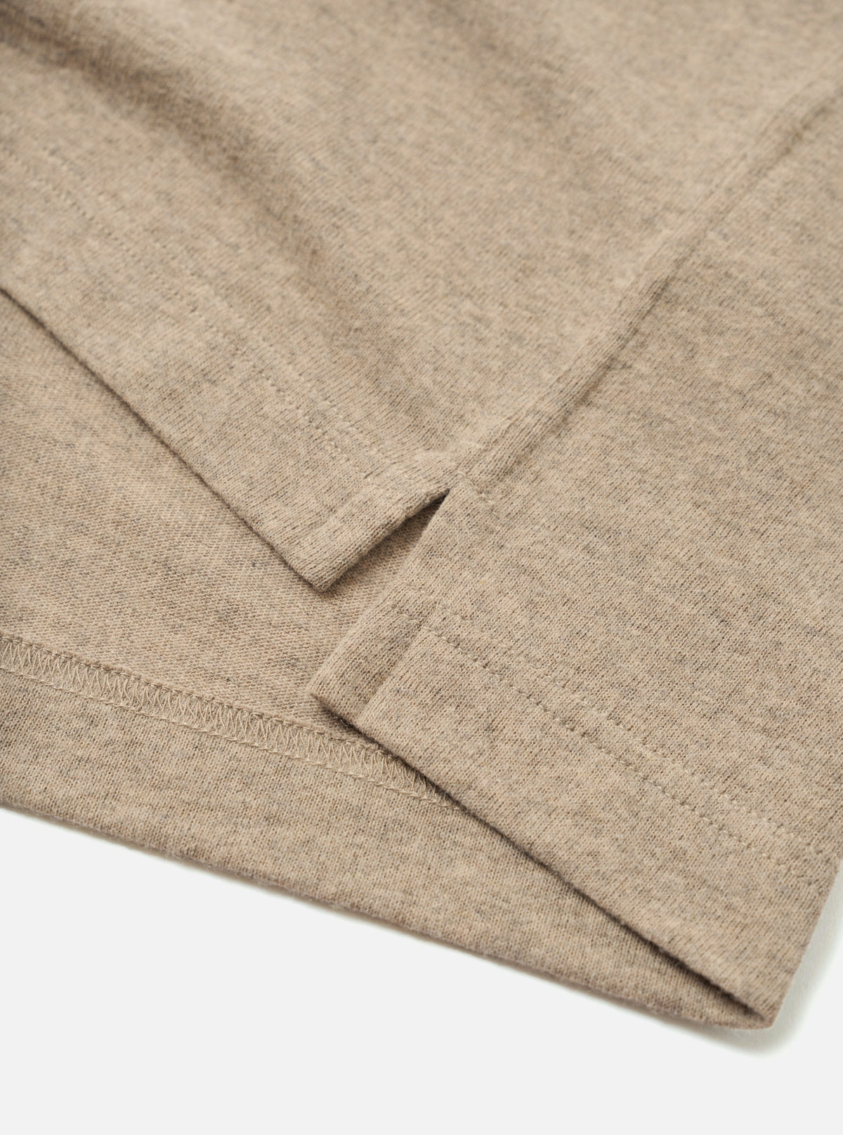 Close-up detail view of the Dark Sand Recycled Wool Mix SJ Pullover L/S Shirt on a light background, emphasizing the four-button placket, fashioned collar, chest pocket, and neat stitching details.