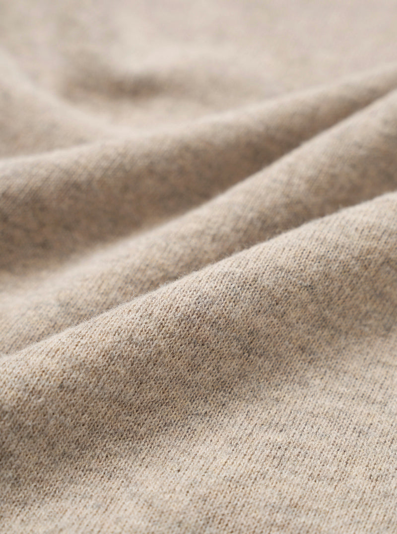 Fabric swatch image showing a close-up view of the Dark Sand Recycled Wool Mix SJ Pullover L/S Shirt material, highlighting the heathered sand shade and soft recycled wool jersey knit texture.