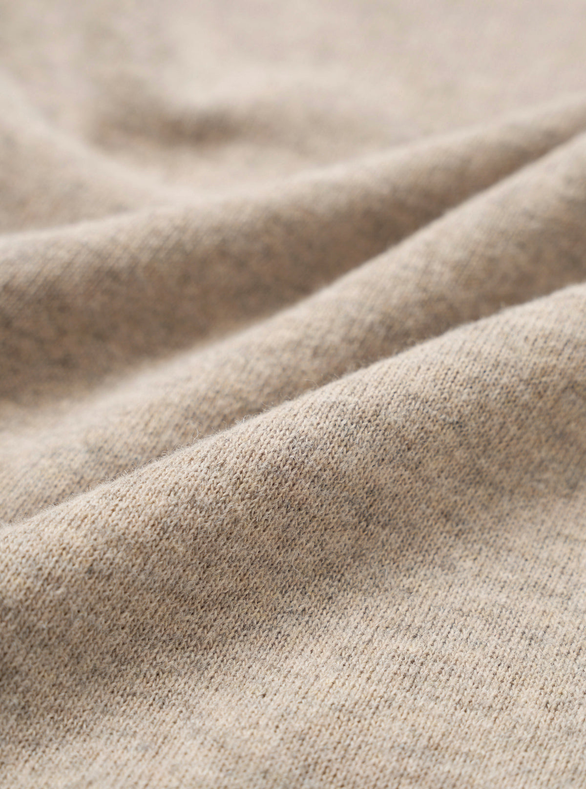 Fabric swatch image showing a close-up view of the Dark Sand Recycled Wool Mix SJ Pullover L/S Shirt material, highlighting the heathered sand shade and soft recycled wool jersey knit texture.