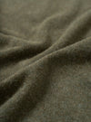Close-up fabric swatch of the Olive Recycled Wool Mix SJ Pullover L/S Shirt, displaying the olive green heathered finish and fine weave of the recycled wool and polyester blend single jersey.