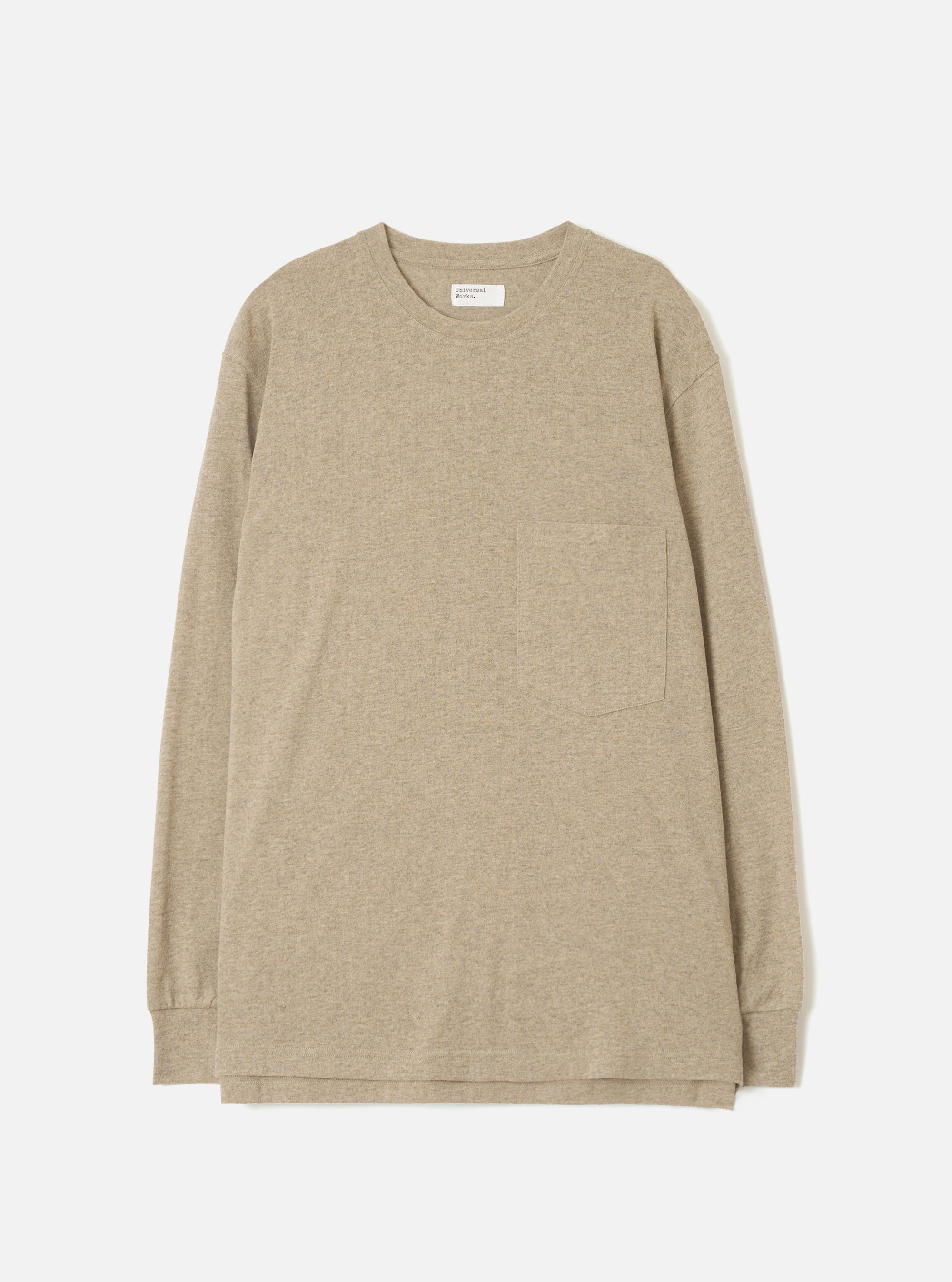 Dark sand marl long-sleeve pocket tee in recycled wool mix jersey, laid flat on a white studio backdrop. Features a crew neck, single patch chest pocket, ribbed cuffs, and a straight hem. A Universal Works woven label sits at the inside neckline.