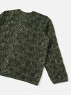 Rear view of the Olive Snug Fleece Cardigan displayed against a light background, highlighting the textured olive wool-blend fleece fabric, back seam construction, and contrasting edge binding.