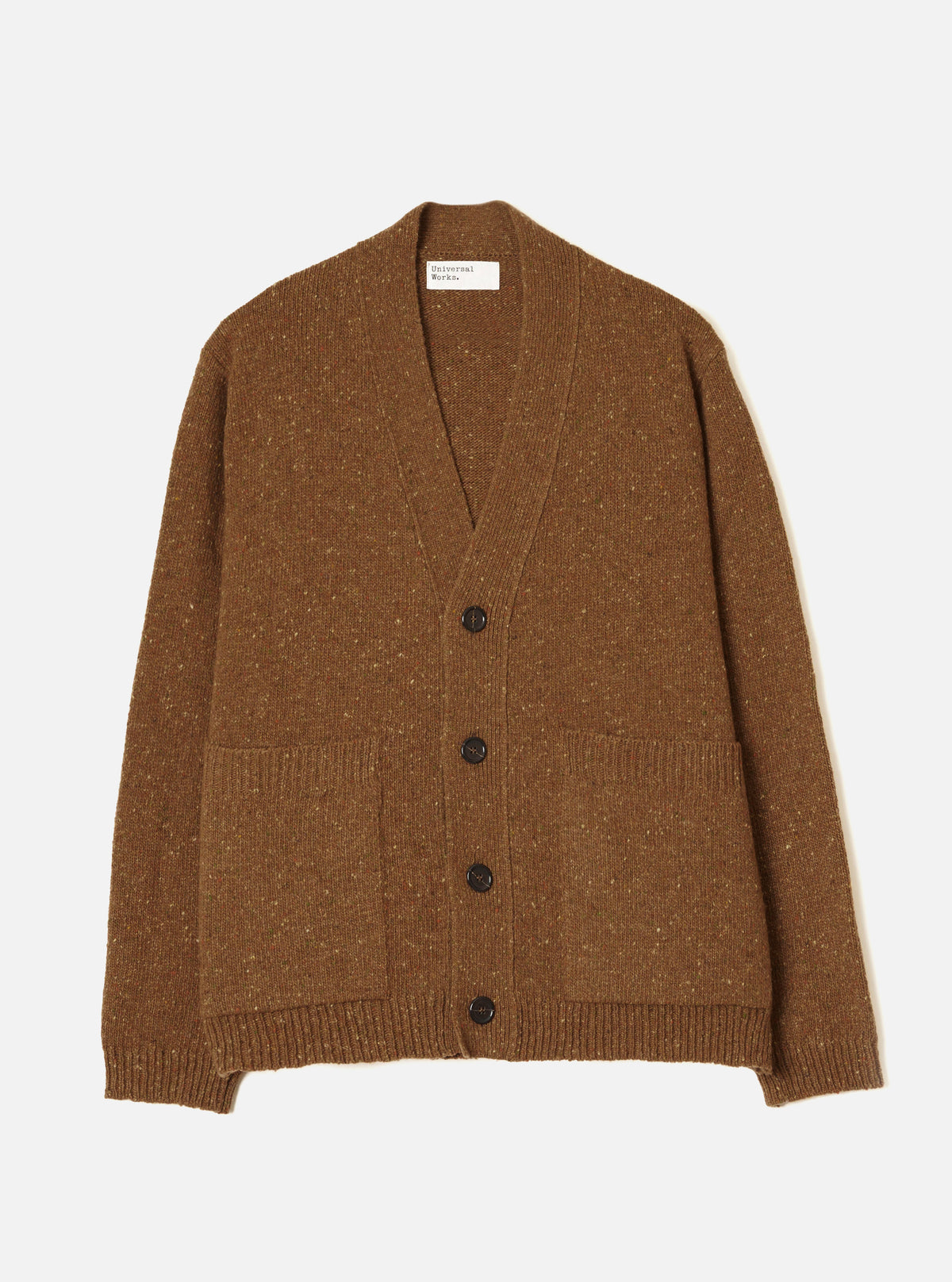 A male model wearing the Brown Wool Fleck Langdale Cardigan against a plain light background. The front view highlights the loose relaxed fit, button closure, patch hand pockets, and warm brown flecked knit fabric.