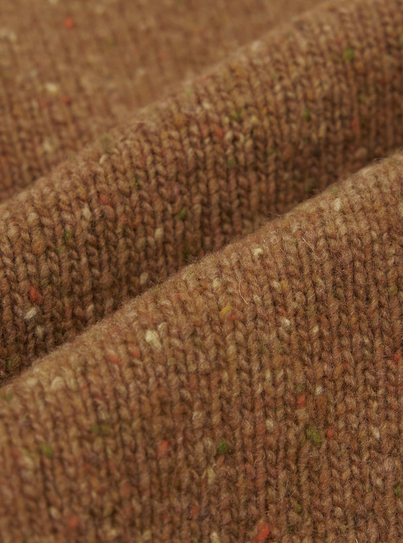 A close-up fabric swatch image of the Brown Wool Fleck Langdale Cardigan against a plain background, highlighting the flecked textured pattern, soft recycled wool material, and rich brown color tone.