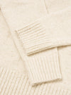 A detailed close-up image of the Fawn Wool Fleck Roll Neck collar, displaying the intricate ribbed knit structure and soft recycled wool texture accented with subtle multi-colored flecks.