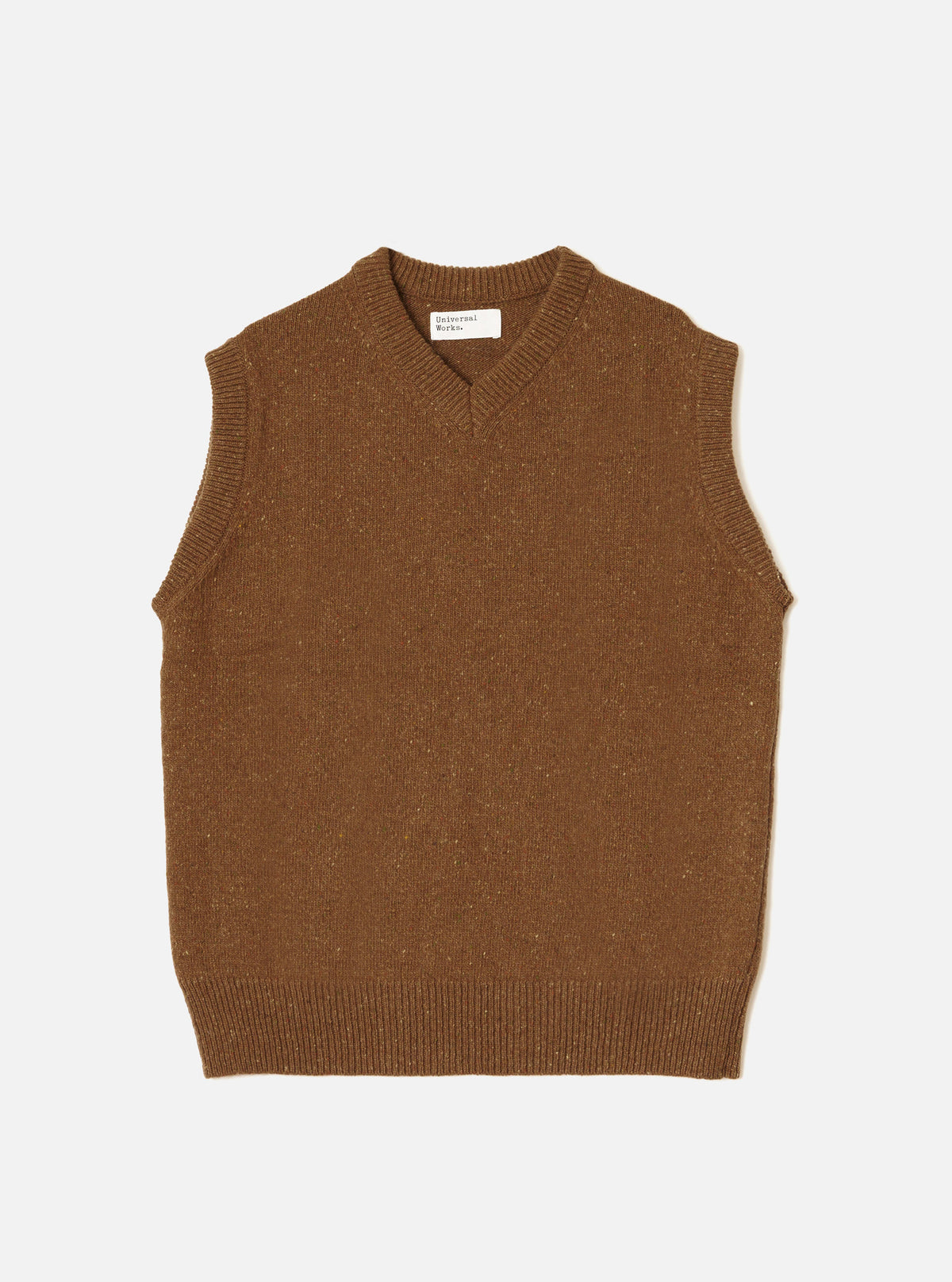 A model wearing the Brown Wool Fleck Sweater Vest against a clean studio backdrop. The sleeveless knit features a V-neck opening, ribbed edges, and a rich brown recycled wool fabric with fleck details.
