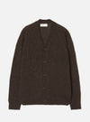 A model wearing the Brown Alpaca Knit David Cardigan against a plain light studio background. The cardigan features a button-front closure, classic v-neckline, patch pockets, and a soft alpaca blend texture.