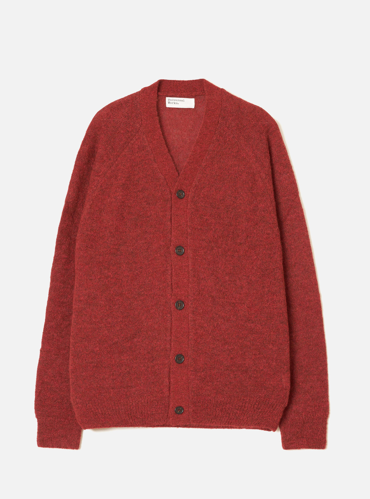 A model wearing the Deep Orange Alpaca Knit David Cardigan on a simple neutral background. The vibrant cardigan highlights a buttoned front, relaxed fit, V-neck design, and fluffy alpaca blend texture.