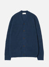 A model wearing the Navy Alpaca Knit David Cardigan against a studio backdrop. The classic cardigan showcases a front button placket, V-neck collar, dual patch pockets, and a soft alpaca blend knit weave.