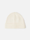 An Ecru Merino Knit Watch Cap displayed flat against a plain studio background. The classic knitted beanie features a soft ribbed texture, a turn-up cuff, and a comfortable stretchy fit in off-white ecru merino wool.