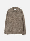 A full front view of the Ecru/Brown Lambswool Zip Cardigan against a stark white background. The soft lambswool cardigan features contrasting ecru off-white and brown tones, a full metal zip closure, and a cozy high collar.