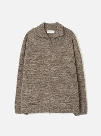 A full front view of the Ecru/Brown Lambswool Zip Cardigan against a stark white background. The soft lambswool cardigan features contrasting ecru off-white and brown tones, a full metal zip closure, and a cozy high collar.