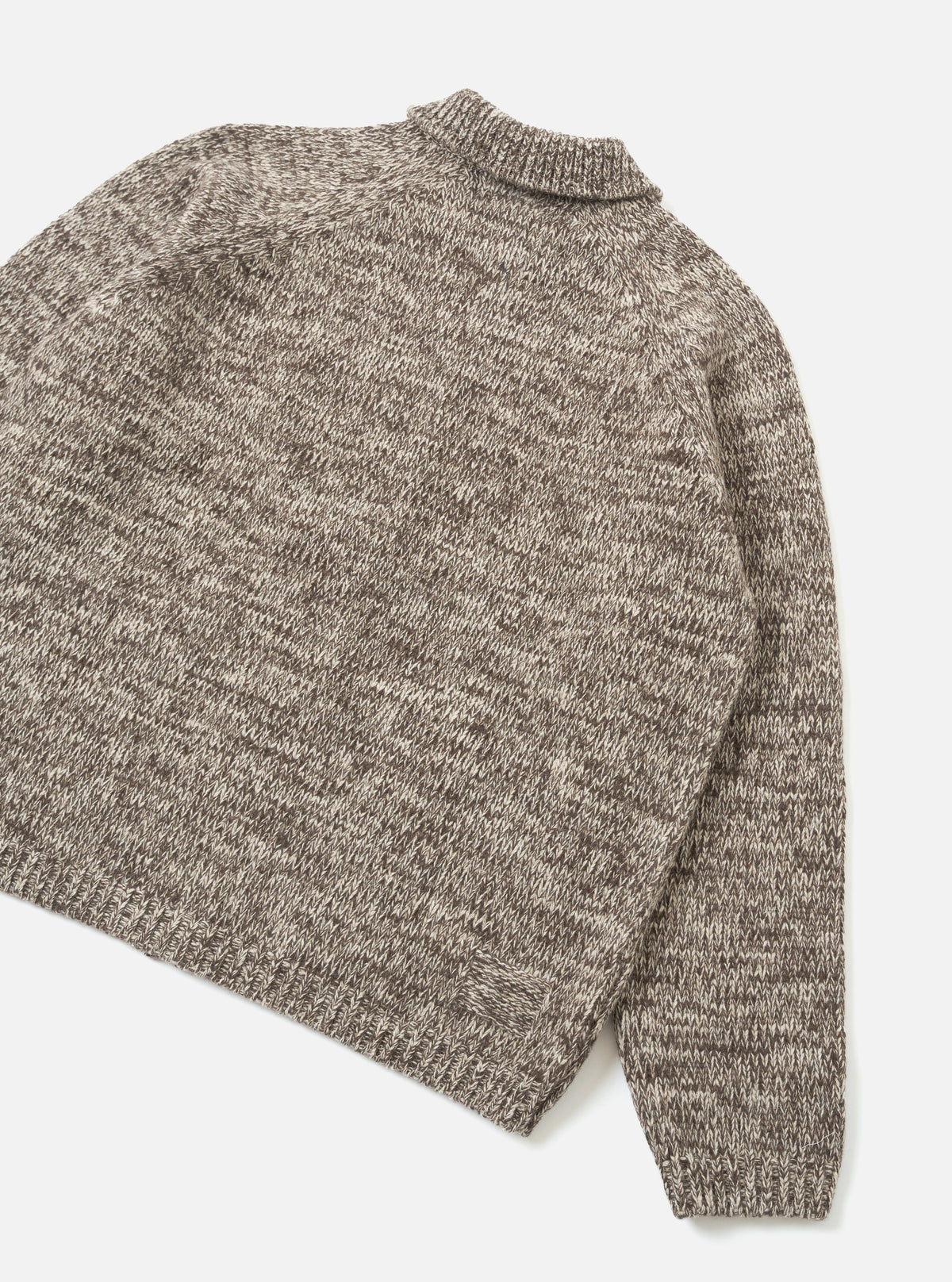 A rear view of the Ecru/Brown Lambswool Zip Cardigan shown on a plain white studio background. The knit garment highlights the smooth back panel construction, set-in long sleeves, and contrasting brown and ecru wool patterning.