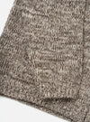 A close-up detail view of the Ecru/Brown Lambswool Zip Cardigan set against a clean white background. The photo showcases the soft lambswool knit texture, zipper fastening, ribbed funnel neck, and fine color contrast detailing.