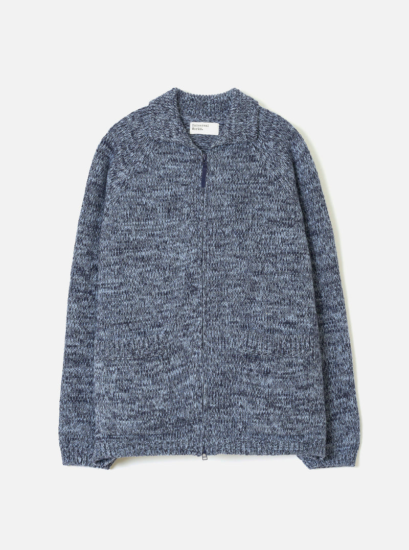 A full front view of the Sky/Navy Lambswool Zip Cardigan displayed on a clean white background. The knit cardigan features a sky blue and navy tone combination, full front zip fastening, high collar, and ribbed cuffs and hem.