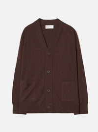 Espresso brown merino knit cardigan laid flat on a light grey backdrop. V-neck with a ribbed placket, four dark horn-effect buttons, two patch pockets at the hip, raglan sleeves, ribbed cuffs and hem. Universal Works woven label visible at the inner neckline.