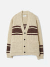 Front view of the Ecru Chunky Knit Stripe Langdale Cardigan on a plain white background. Features a deep V-neckline, four-button placket, two patch pockets, and a bold intarsia horizontal stripe pattern on thick off-white wool.