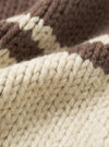 A close-up fabric swatch of the Ecru Chunky Knit Stripe Langdale Cardigan. The detailed shot highlights the rich texture, heavy weave, and contrasting intarsia stripe pattern of the ecru wool yarn against a plain white background.