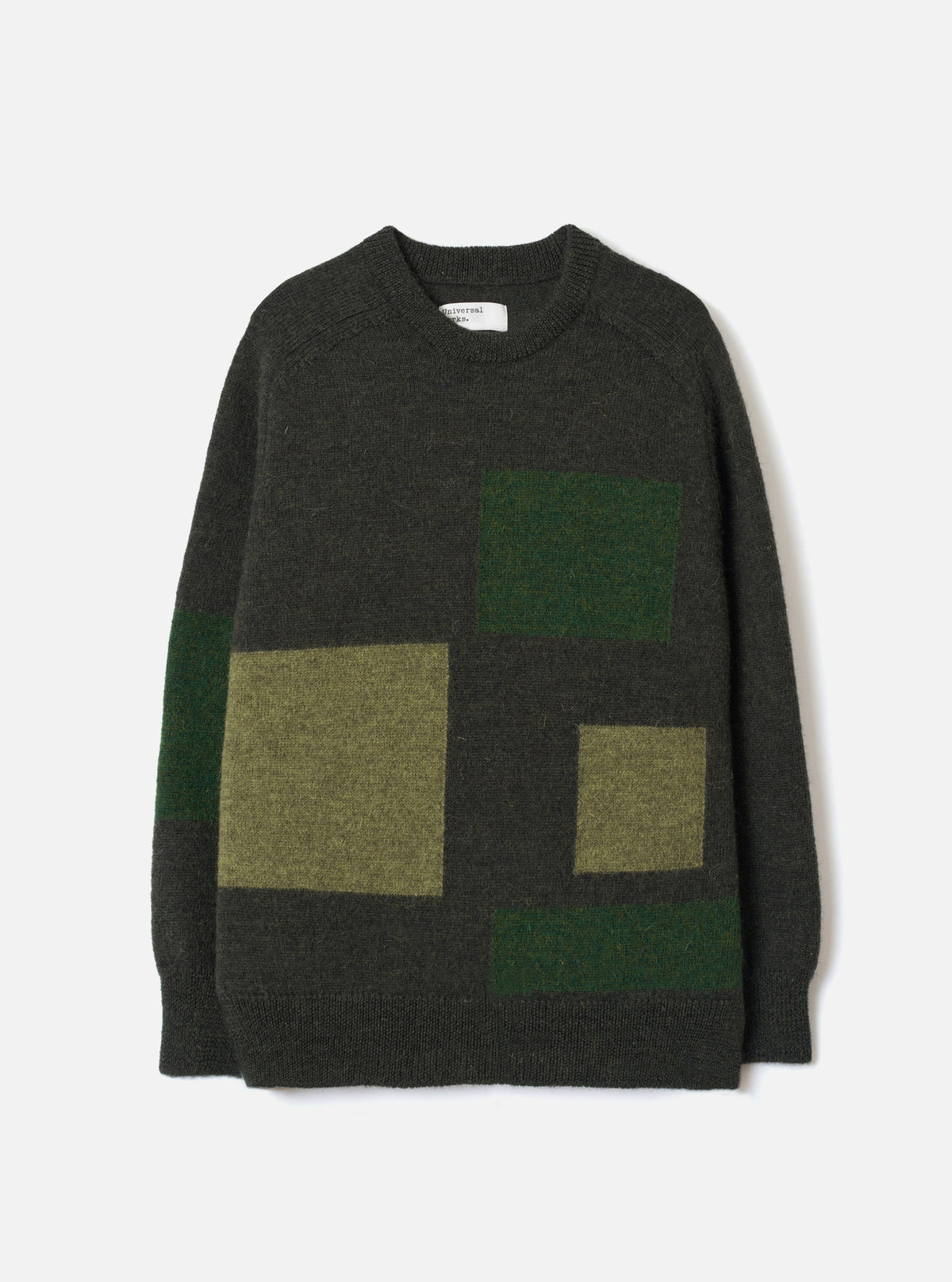 Front view of the Olive British Wool Lyon Crew sweater set against a plain white background. Features a traditional crew neckline, raglan sleeves, ribbed trims, and an easy fit silhouette in marled olive green British wool yarn.