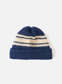 Full view of the Navy Chunky Knit Stripe Lenny Hat set on a plain white studio background. Features a close-fitting beanie style with a thick turned-up cuff, ribbed texture, and a navy blue chunky knit stripe design throughout.