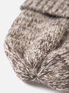 A detailed close-up shot of the Ecru/Brown Lambswool Watch Cap set against a plain white background, highlighting the cozy lambswool knit fabric, fine stitching, and subtle two-tone color pattern.
