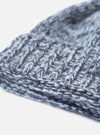 An angled product view of the Sky/Navy Lambswool Watch Cap set on a clean white studio background. The image details the soft lambswool yarn construction, blue shade gradient, and folded cuff.