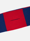 A detailed close-up shot of the Blue/Red Soft Wool Deluxe Football Scarf on a plain white studio background, focusing on the knitted soft wool texture, neat edge finish, and vibrant color block design.