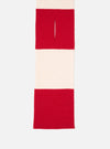 An angled view of the Ecru/Red Soft Wool Deluxe Football Scarf laid out on a clean white studio background. The image highlights the soft wool weave, vibrant red accent panels, and fine fringed ends of the scarf.