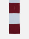 An angled product image of the Sky/Claret Soft Wool Deluxe Football Scarf isolated on a plain white studio background, displaying the contrast between sky blue and deep claret red soft wool knit with fringe trim details.