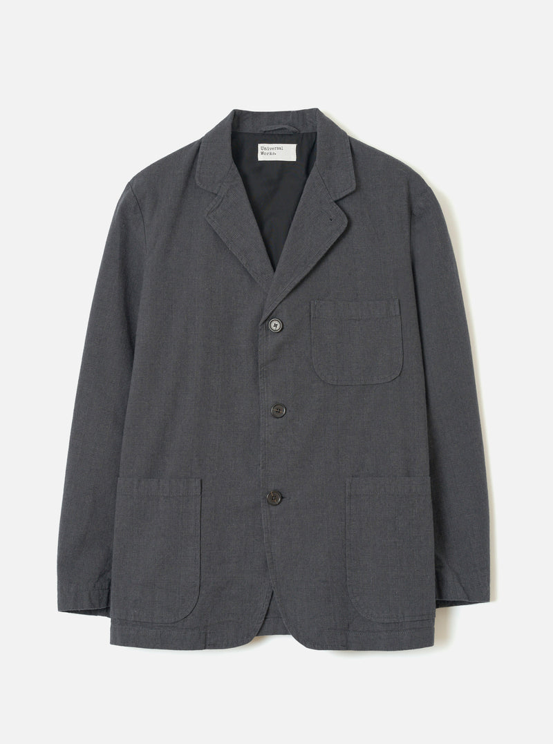 A full front product view of the Grey Liverpool Check Three Button Jacket on a plain white background. The jacket features a classic three-button front closure, notched lapels, flap pockets, and a subtle grey checked cotton-linen fabric.