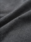 A macro close-up fabric swatch view of the Grey Liverpool Check material against a plain white background, showcasing the fine weave, light grey and dark check pattern, and natural cotton-linen blend texture of the fabric.