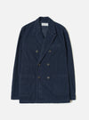 A full front view of the Dark Navy Cord Manor Jacket set against a clean white studio background. The jacket showcases a dark navy blue fine corduroy cotton fabric, buttoned front placket, fold-down collar, and front patch pockets.