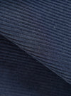 A close-up fabric swatch image of the Dark Navy Cord Manor Jacket set against a neutral white background. The shot focuses on the detailed texture of the dark navy fine-wale cotton corduroy material.