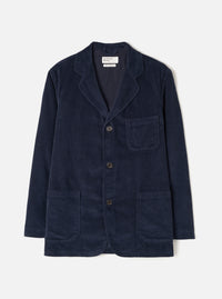 Front view of the Dark Navy Cord Three Button Jacket worn by a model against a plain studio background. The jacket features three front buttons, notch lapels, three open patch pockets, and dark navy cotton corduroy fabric.