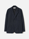 Front view of the Dark Navy Dublin Wool Mix Two Button Jacket worn by a model on a plain background. The jacket features a two-button front fastening, wider notched lapels, two lower patch pockets, and a single chest pocket.