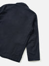 Back view of the Dark Navy Dublin Wool Mix Two Button Jacket worn by a model set against a neutral studio background. The image demonstrates the relaxed fit, structured shoulders, and dark navy woven wool-blend texture.