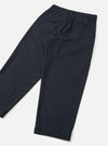 Back view of the Dark Navy Dublin Wool Mix Oxford Pant worn by a model against a clean studio background. The image highlights the rear pockets, relaxed seat, straight leg silhouette, and dark navy textured wool-blend fabric.