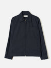 Front view of the Dark Navy Dublin Wool Mix Rose Bowl Jacket worn by a model against a plain studio background. The boxy jacket features a full front zip, oversized collar, large chest patch pocket, and dark navy wool-blend fabric.