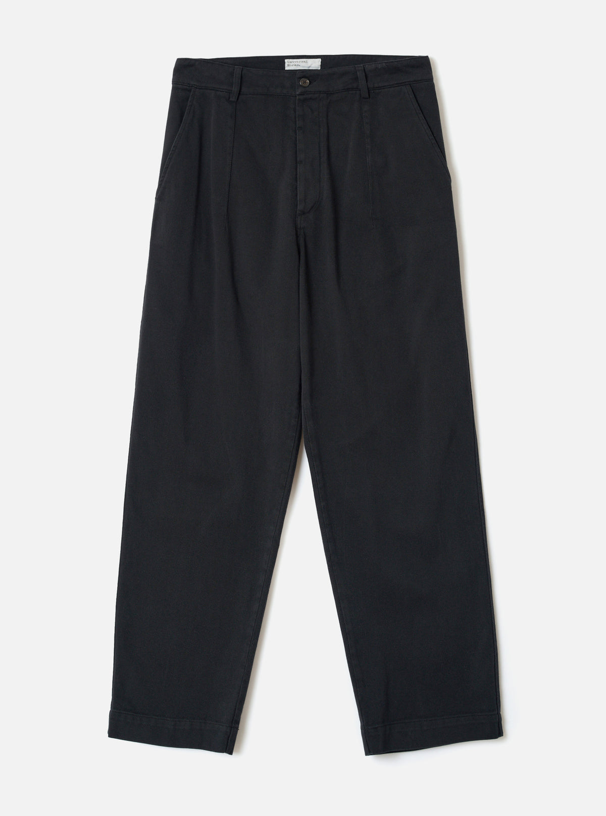 Front view of the Black Dexter Twill Grad Chino displayed against a plain off-white background. The shot showcases the fixed waistband, button closure, side pockets, and loose tapered leg silhouette of the garment.