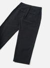 Back view of the Black Dexter Twill Grad Chino presented against a clean off-white background. The shot highlights the military fatigue inspired back pockets, rear seam construction, and organic cotton twill fabric.