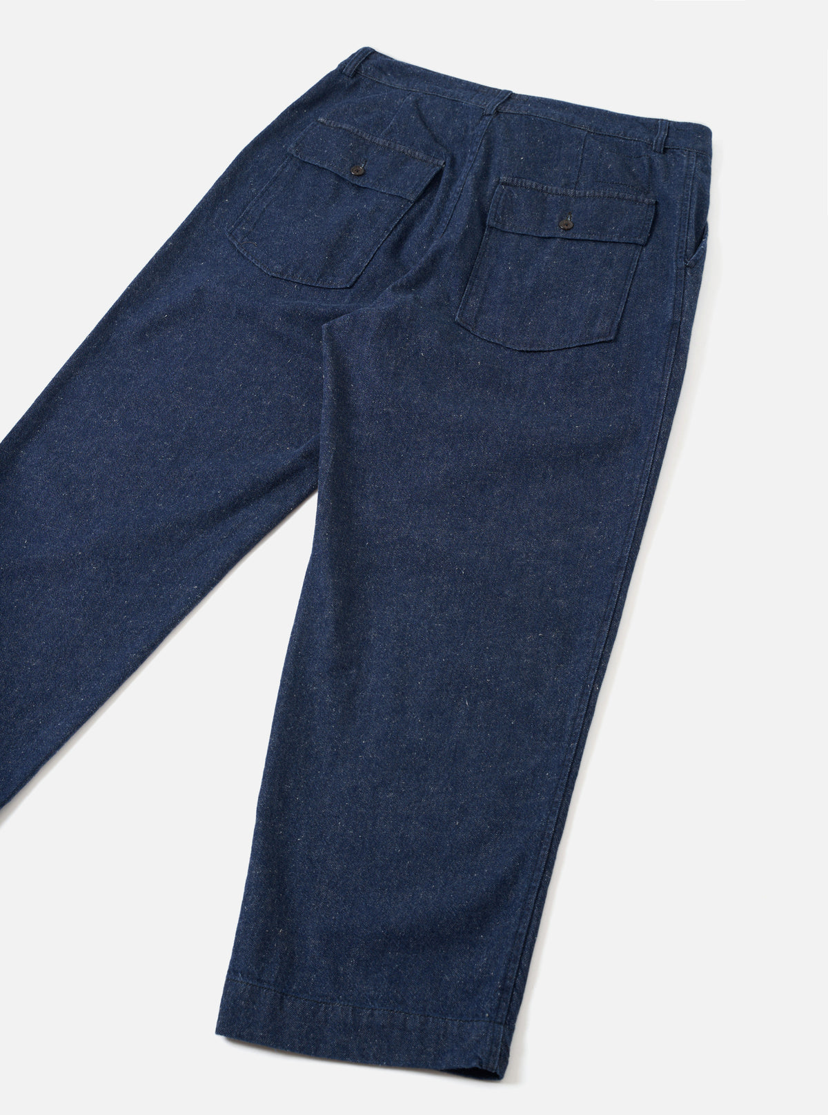 Back view of the Indigo Future Denim Grad Chino presented against a plain white background. The image details the rear buttoned-flap patch pockets, clean back seam, and rich indigo denim fabric shade.