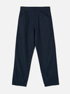 Front view of the Navy Slub Sateen Utility Pant set against a plain off-white background. The shot highlights the diagonal front frogmouth pockets, zip fly, belt loops, and relaxed tapered leg cut.