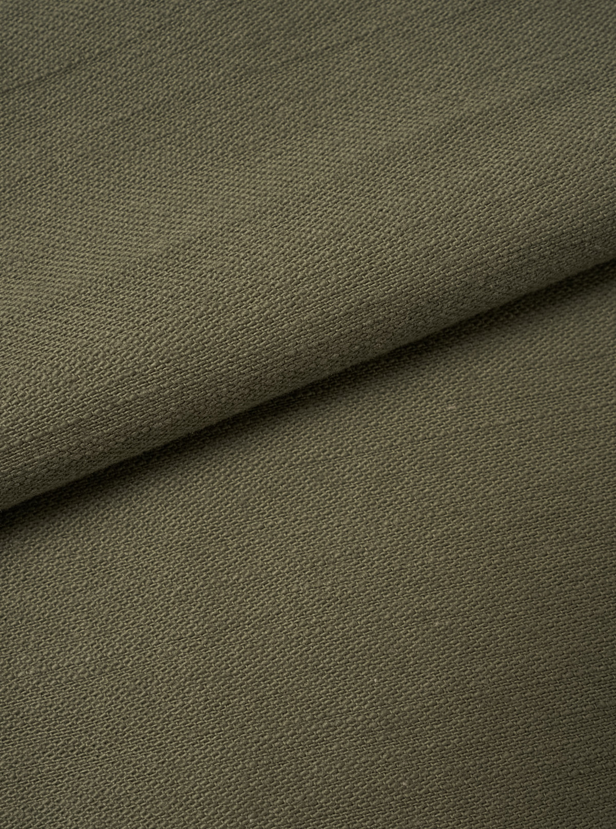 A close-up fabric swatch showing the rich olive green slub sateen cotton material. The shot fills the frame to emphasize the distinct woven texture, natural slub variation, and fabric surface details.