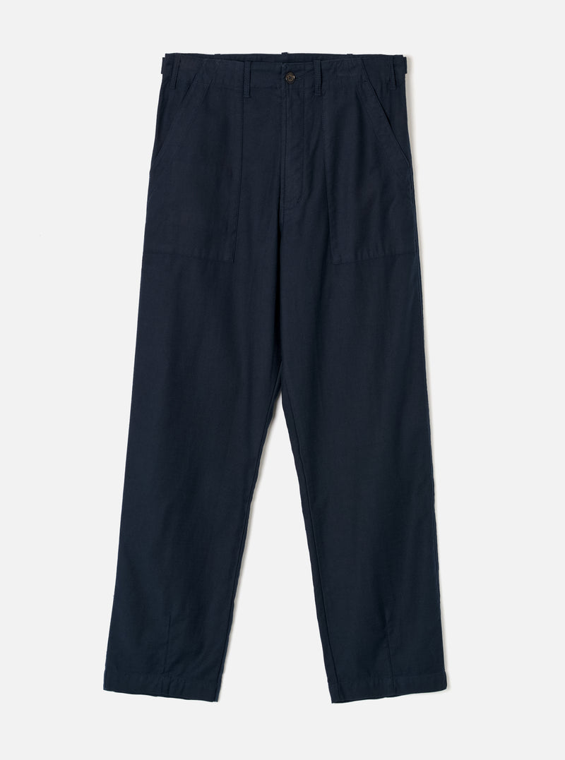 Front view of the Navy Slub Sateen Loose Fatigue Pant displayed flat against a clean off-white background. The shot highlights the deep navy cotton sateen fabric, comfortable relaxed silhouette, structured waistband, and front fatigue pockets.