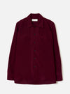 Front view of the Dark Red Dam Marl Work Shirt displayed against a plain off-white background. The shot highlights the one-piece collar, two chest flap pockets, button front closure, and curved hem silhouette.