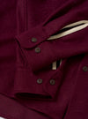 A rear view of the Dark Red Dam Marl Work Shirt set against a clean off-white background. The shot displays the back yoke construction, soft brushed fabric texture, and straight hang of the hemline.