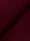 A close-up fabric swatch view showing the textured weave and soft brushed finish of the Dark Red Dam Marl Work Shirt. The detailed image fills the frame to emphasize the rich dark red marl fleece fabric.