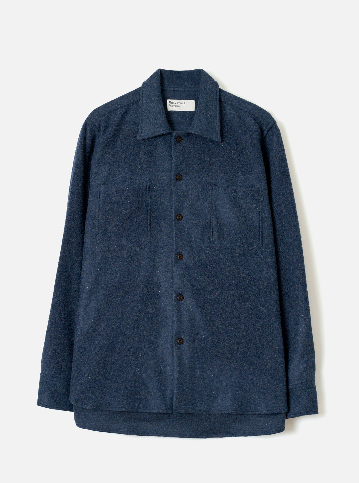 Front view of the Navy Dam Marl Work Shirt presented against a clean off-white background. The shot highlights the classic open collar, two functional chest pockets, and navy blue button-front placket.