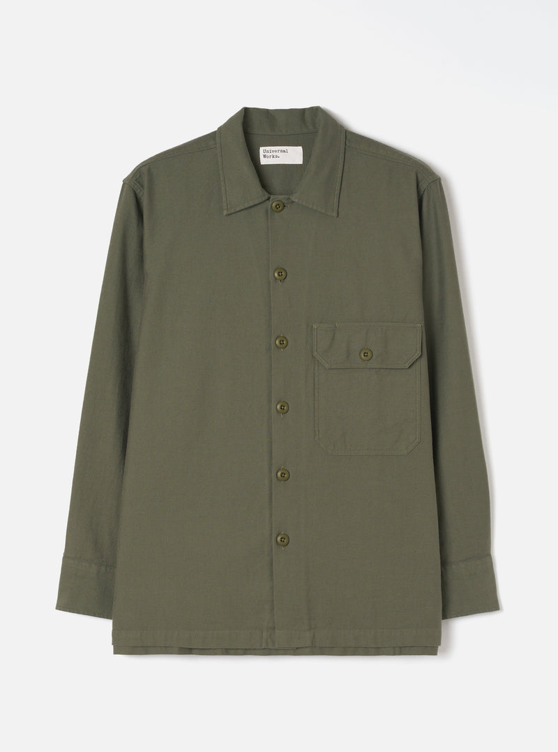 Front view of the Olive Slub Sateen Fatigue Shirt set against a plain white background. The shot highlights the chest flap pockets, button-down front closure, and olive green cotton sateen material.