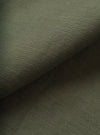 A detailed close-up swatch image showcasing the texture and weave of the Olive Slub Sateen Fatigue Shirt. The filling-frame shot highlights the rich olive green tone and tactile slub cotton fabric.